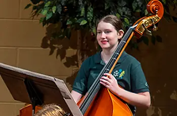 Girl playing String Bass
