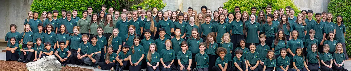 Young people in dark green shirts