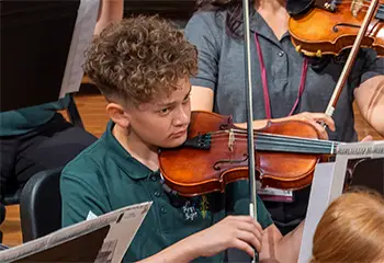 Boy playing violin