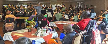 young people playing for residents