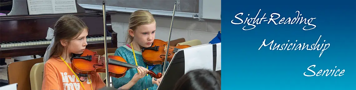 2 girls playing violins