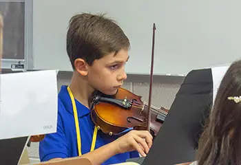 boy playing violin