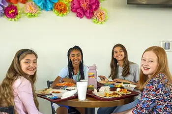 students eating together