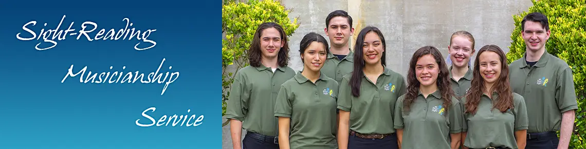 8 young people in green shirts